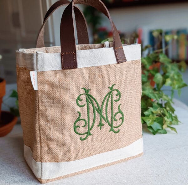 A small bag with the letter m on it