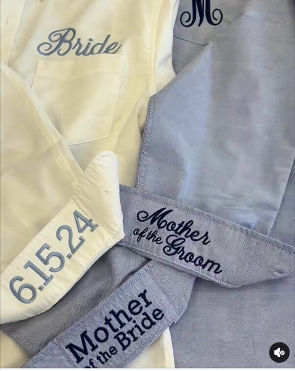 A close up of the bride and mother of the groom robes