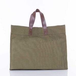 A brown bag sitting on top of a white table.