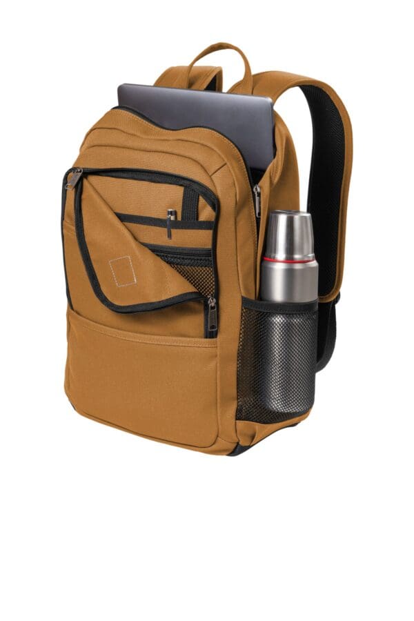 A backpack with a water bottle in it