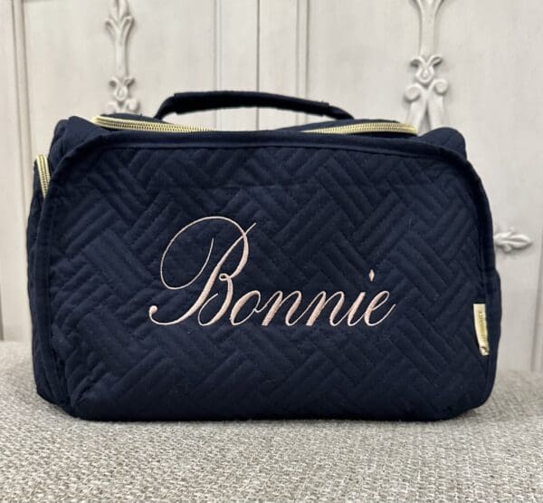 A black bag with the name bonnie on it