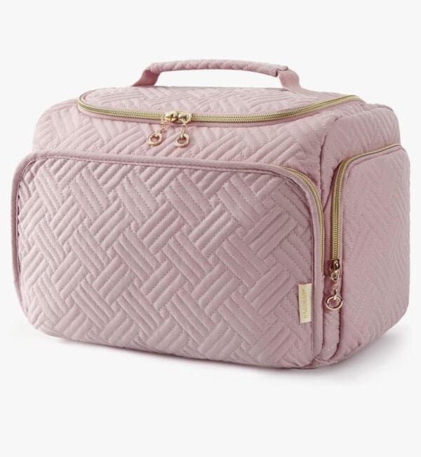 A pink bag with gold accents on it.