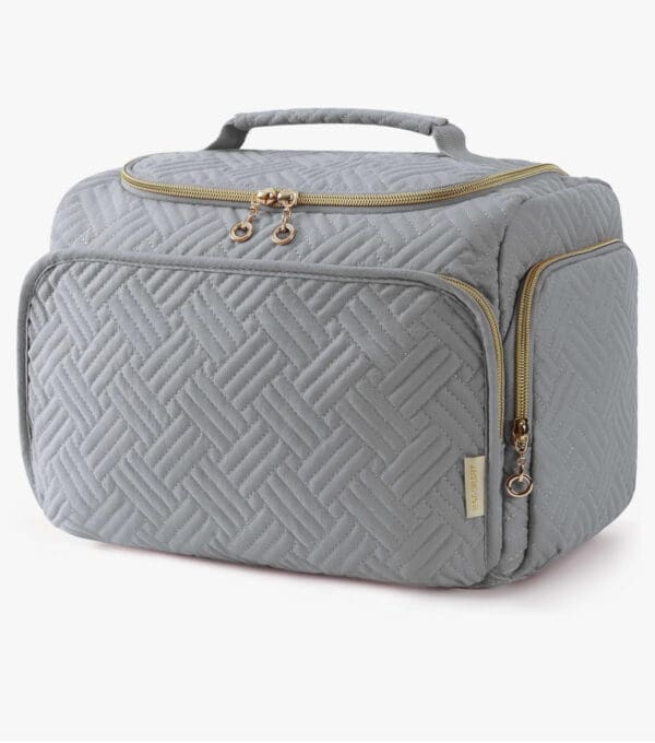 A gray bag with gold accents on it.