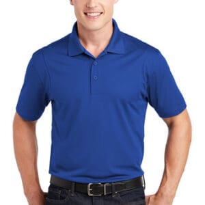 A man wearing blue polo shirt and jeans.