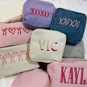 Personalized corduroy cosmetic bags.